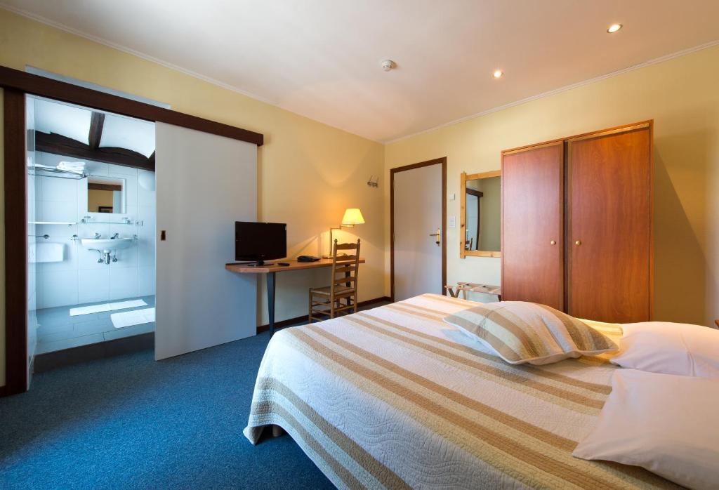Auberge Le XIX Eme Thulin Rum bild